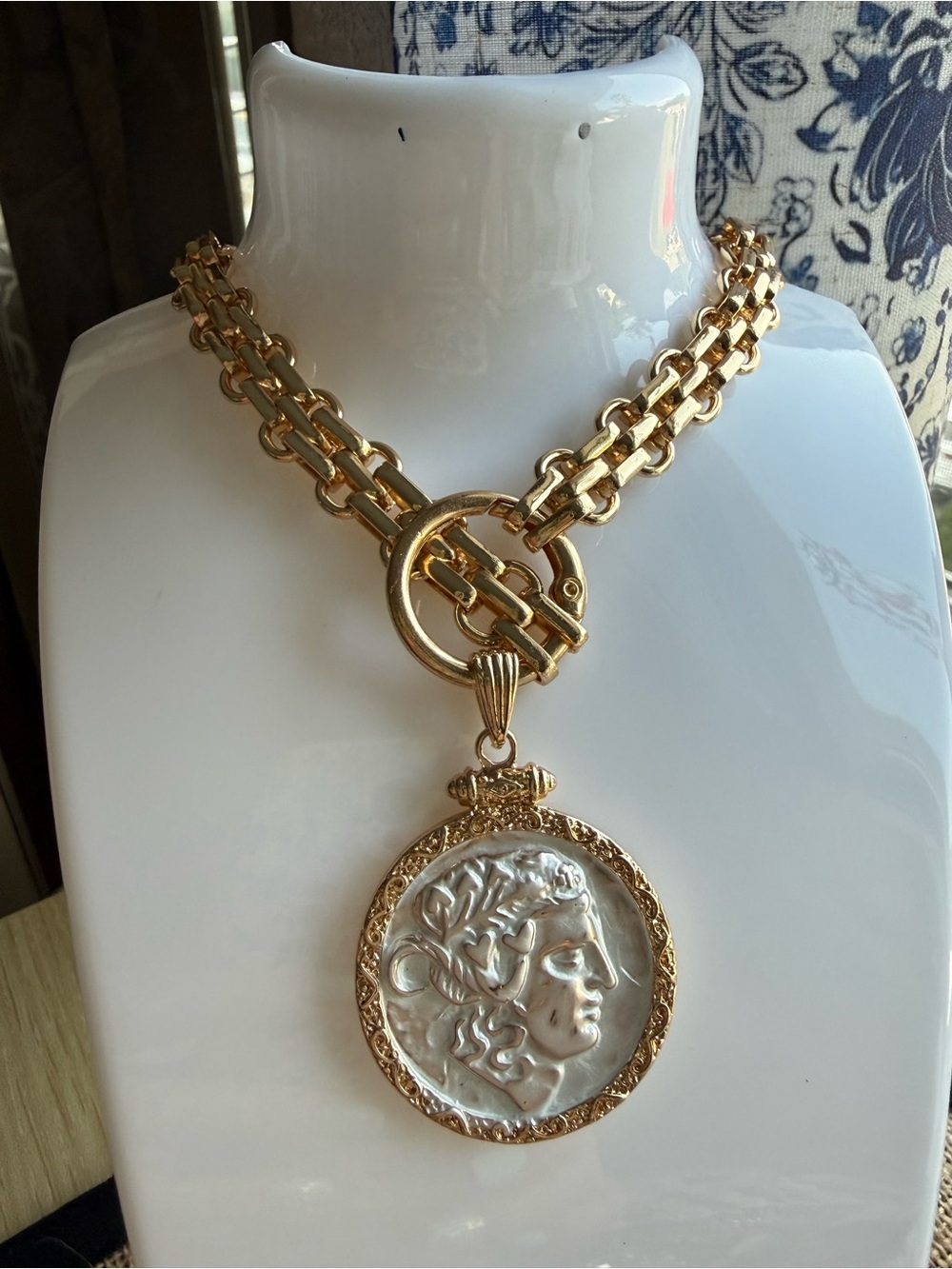 Gold-Tone Medallion Pendant Necklace with White Cameo Accent